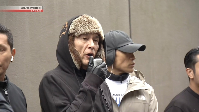 កូនប្រុសលោកស្រី ស៊ូជី ស្រែកតវ៉ានៅតូក្យូ ទាមទារដោះលែងម្ដាយជាបន្ទាន់